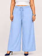 Women Sky Blue Solid Wide Leg Drawstring Palazzo Pants | CHARM