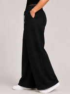 Women Black Solid Wide Leg Drawstring Palazzo Pants | BLAIS