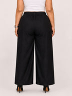 Women Black Solid Wide Leg Drawstring Palazzo Pants | DIVAA