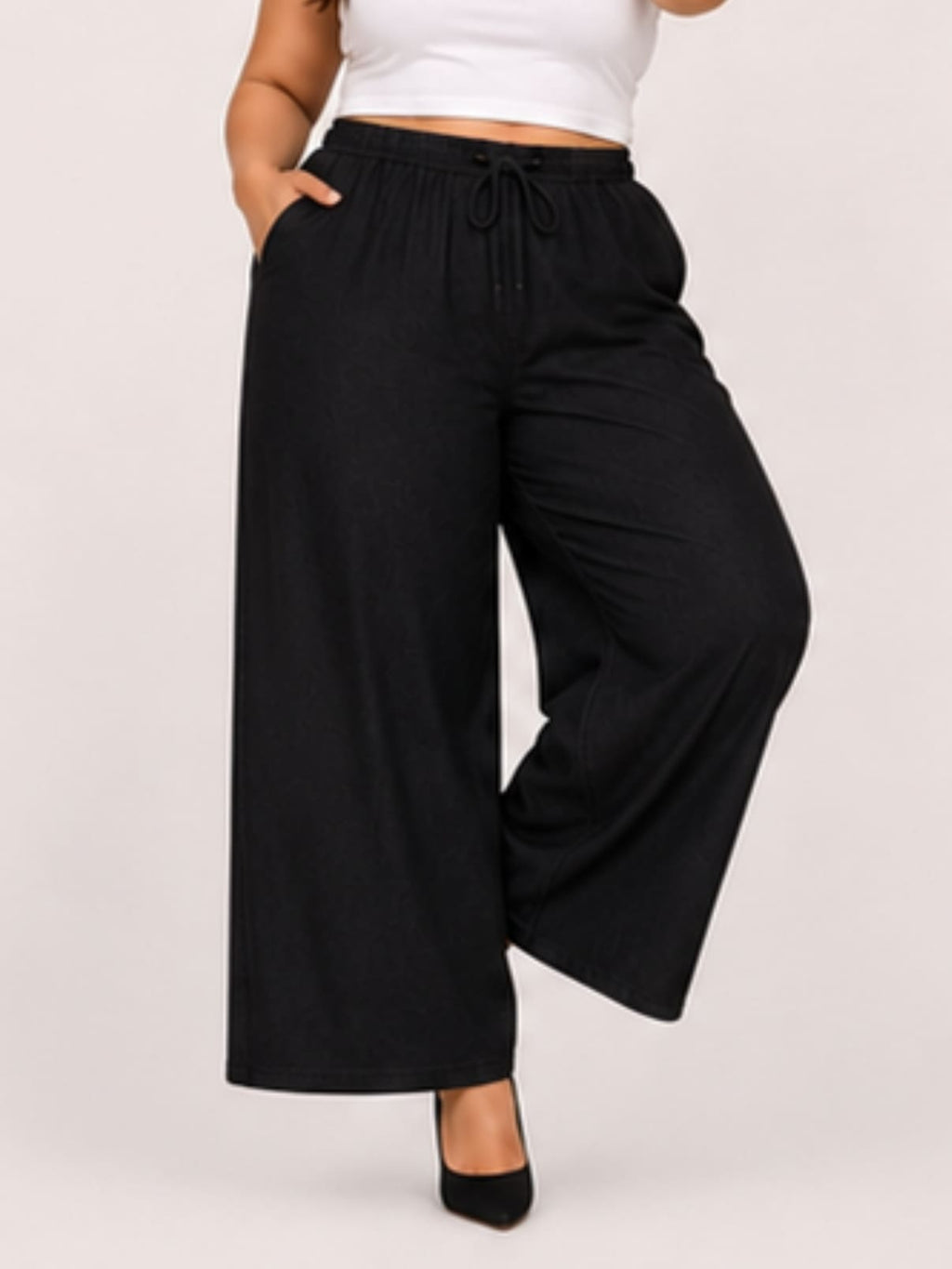 Women Black Solid Wide Leg Drawstring Palazzo Pants | DIVAA