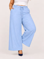 Women Sky Blue Solid Wide Leg Drawstring Palazzo Pants | CHARM